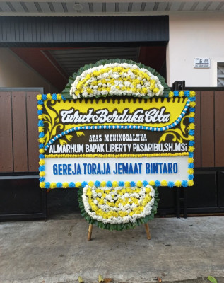 Papan Bunga Duka di Gollo